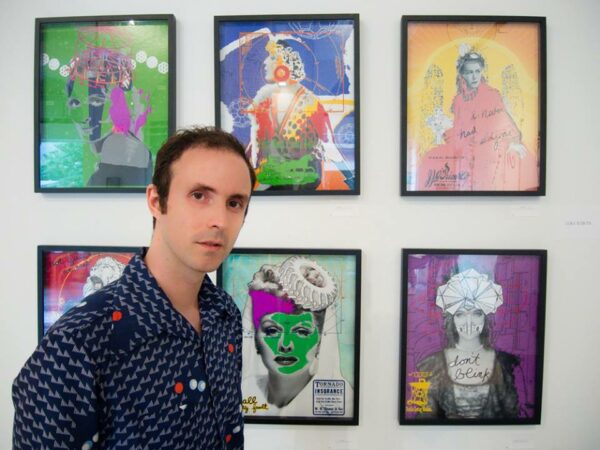 luke kurtis in front of his work at the Just Panic... exhibition in NYC