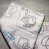 beach towel featuring abstract designs by luke kurtis
