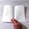 photo of exam(i)nation, a book by luke kurtis, open to show the inside
